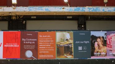 Wild postings on a New York City street corner from the cookware brand Caraway